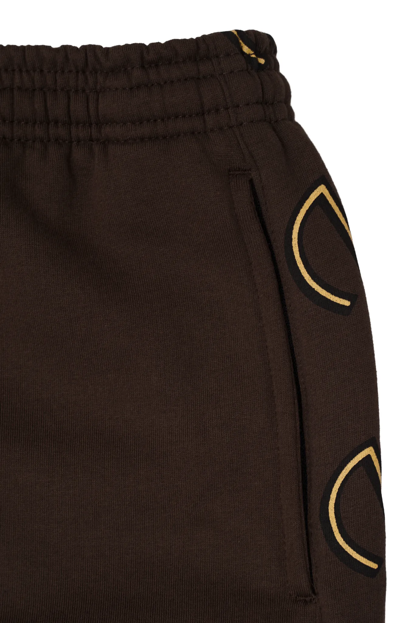 "M'$ & BEYOND" TRACK PANTS IN WOOD