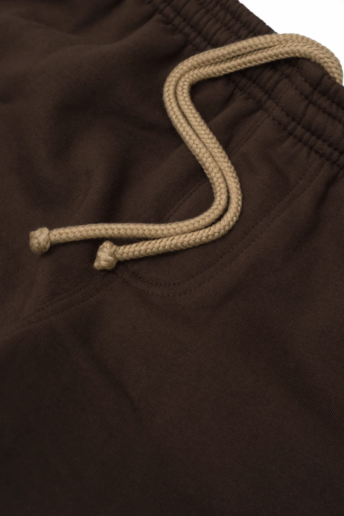 "M'$ & BEYOND" TRACK PANTS IN WOOD
